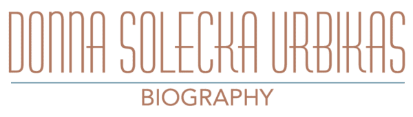 A green background with brown letters and the word " biograpghy ".
